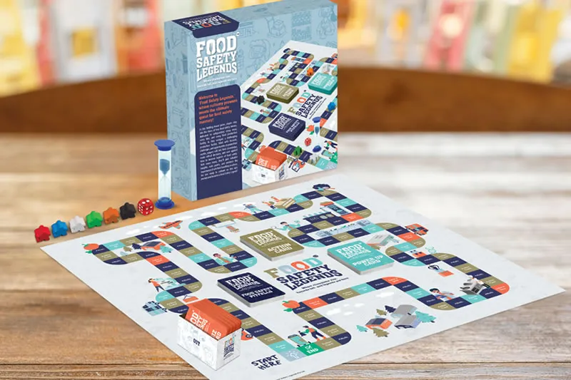 The Food Safety Legends board laid out with tokens, timer and cards
